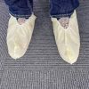 Disposable Shoe Covers for Indoors. 10 Pairs of Yellow Polypropylene Polyethylene Shoe Booties Disposable 82 gsm Waterproof Shoe Protectors with Elast